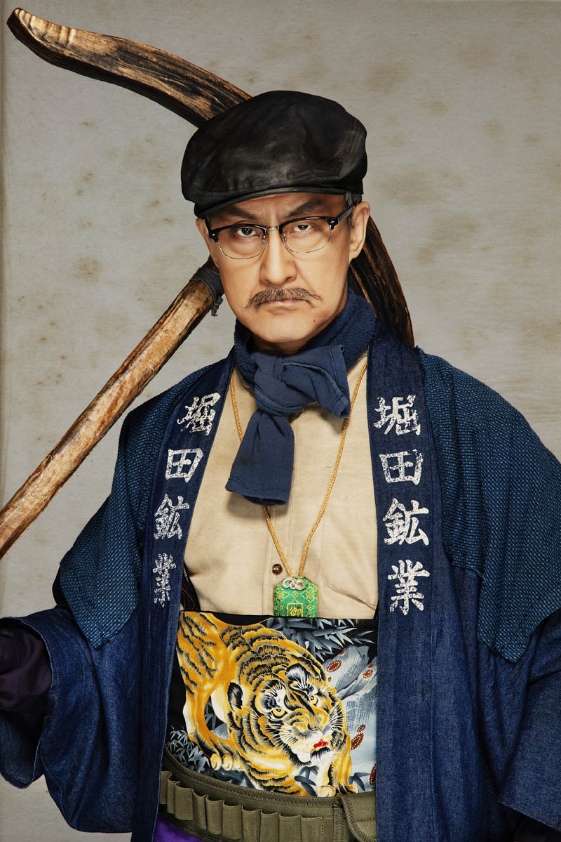 粟根まこと